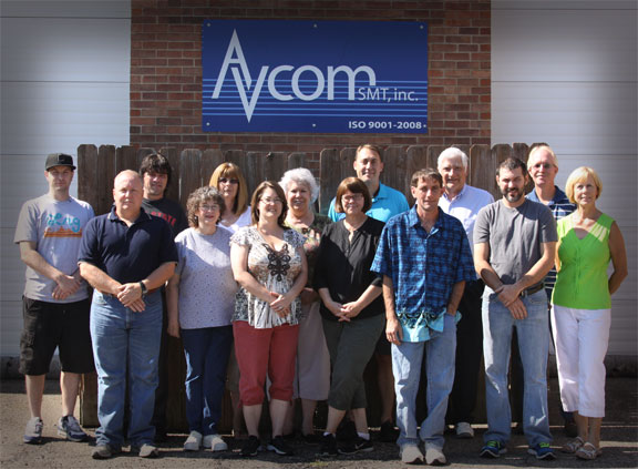 Entire staff photo outside AvcomSMT building in Columbus, Ohio