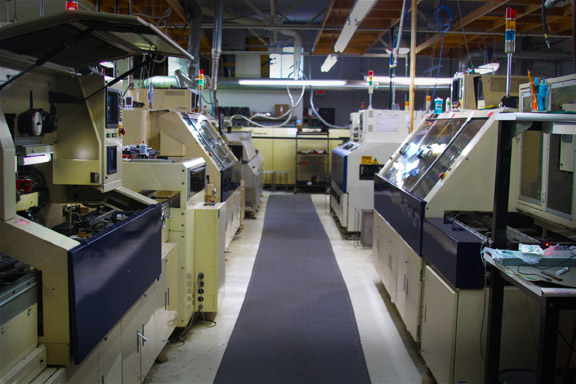 Shop image of surface mount machines.